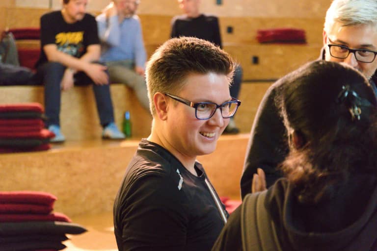 Attendees laughing together